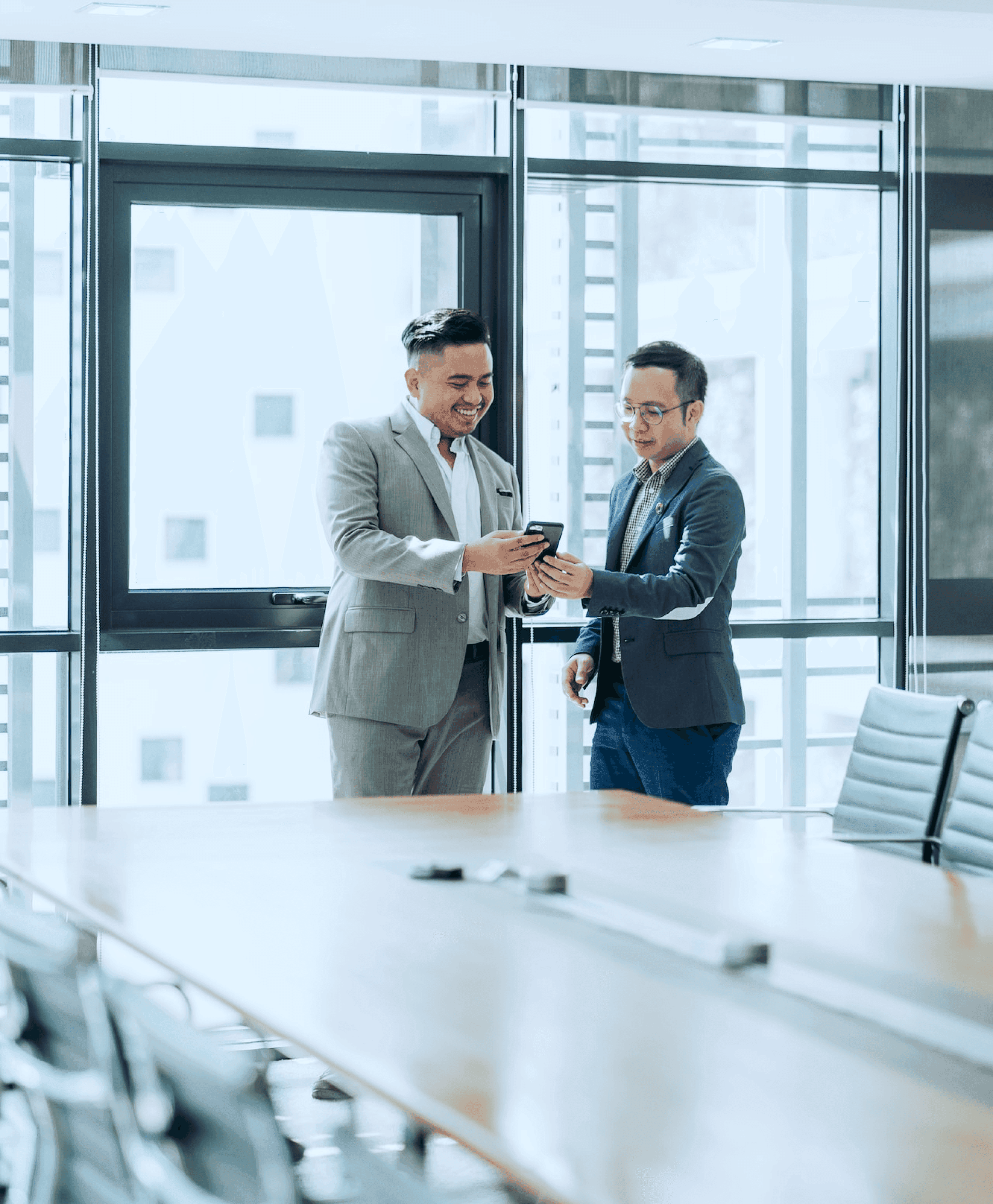 Two business partners reviewing a project together